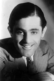Foto de Al Bowlly interpretando a Nightclub Band Guitarist en Up for the Derby