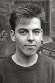 Retrato de Andy Rourke