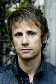 Retrato de Dominic Howard