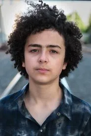 Foto de Elisha Henig como Ben Schuman