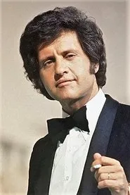Joe Dassin en Nick Carter y el trébol rojo