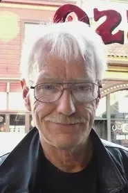 Retrato de Mark Ellinger