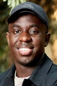 Foto de Melvin Kakooza como Sunday