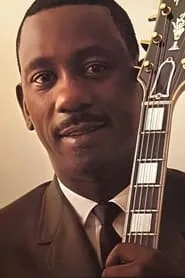 Foto de Wes Montgomery interpretando a Self - Guitar en Jazz Evolution