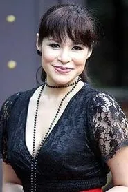 Foto de Zila Bakarin como Datin Kamala