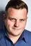 Adam Bartley como Carl Brown