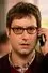 Adam Busch como Warren Mears