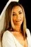 Amanda Donohoe como Lou Stoke