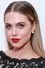 Anne Winters como Charly Burke