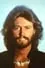 Barry Gibb como Host