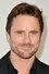 Charles Esten como Barry Grossman