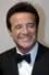 Christian De Sica como Impresario Beppi