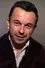 Christophe Fluder como Nano Sarko