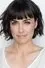Constance Zimmer como Alana Cahill