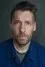 Craig Parkinson como Shaun Merton
