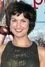 Dagney Kerr como Claudia