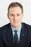 Dan Walker como Host