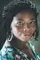 Dela Dabulamanzi como Zina Owusu