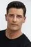 Enver Gjokaj como Donovan Town
