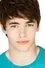 Evan Crooks como Theo