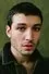Ezra Miller como Tucker Bryant