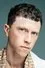 Finnegan Oldfield como Father Etienne