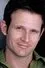 George Hertzberg como Adam