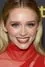 Greer Grammer como April