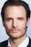 Greg Bryk como Cardellini