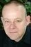 Huw Higginson como Father Cruikshanks