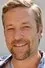 Jack Campbell como Jim Devine