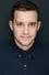 Jacob Zachar como Adam