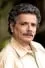Jaime Garza como Román Quijano