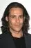 James Callis como Athan Cole / The Witness