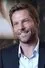 Jamie Bamber como Archie Hughes