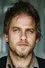 Joel Thomas Hynes como Taylor Gossad