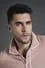 Josh Segarra como Adrian Chase
