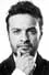 Julián Román como Periodista Salazar