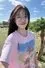 Kelly Huang como Coco