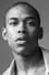 Kelvin Harrison Jr. como Toussant "Touie" Dacey