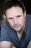 Kirby Morrow como Captain Dave Kleinman