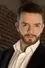 Kyle Downes como Larry Tudgeman