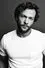 Kyle Schmid como John Wayne Kleinsasser