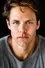 Lachlan Buchanan como Emmett Dixon