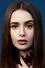Lily Collins como Camila
