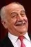 Luigi De Filippo como Don Gaetano Palumbo