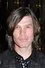 Luke Kenny como Malcolm Mourad