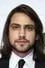 Luke Pasqualino como Basil 'Bas' Baddingham