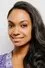 Lyndie Greenwood como Elvi Okoye