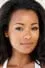 Melanie Liburd como Zoe Baker